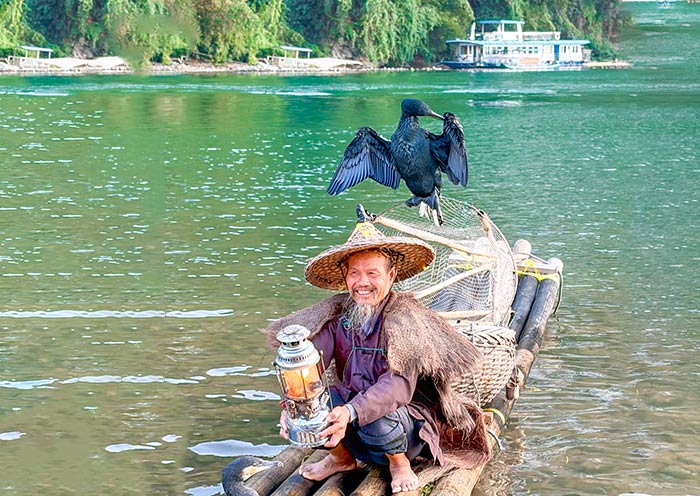Espectáculo de la pesca tradicional con cormoranes en Yangshuo