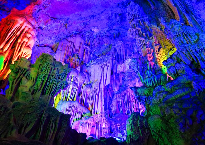 Reed Flute Cave illuminated by colorful lights