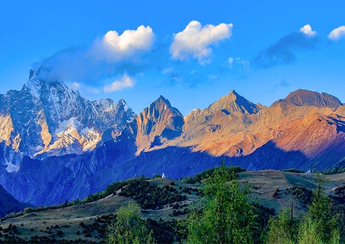 Mount Siguniang, known for its dramatic peaks
