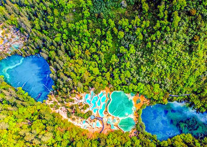 Huanglong National Park features a series of terraced pools